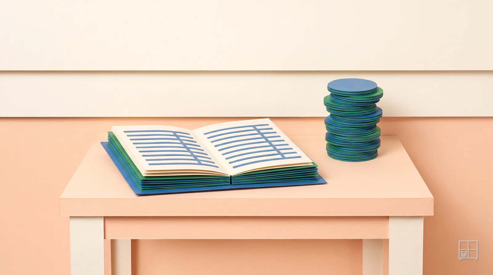 Cut-paper collage of an open ledger of ruled blue lines on a table beside a stack of blue and green discs